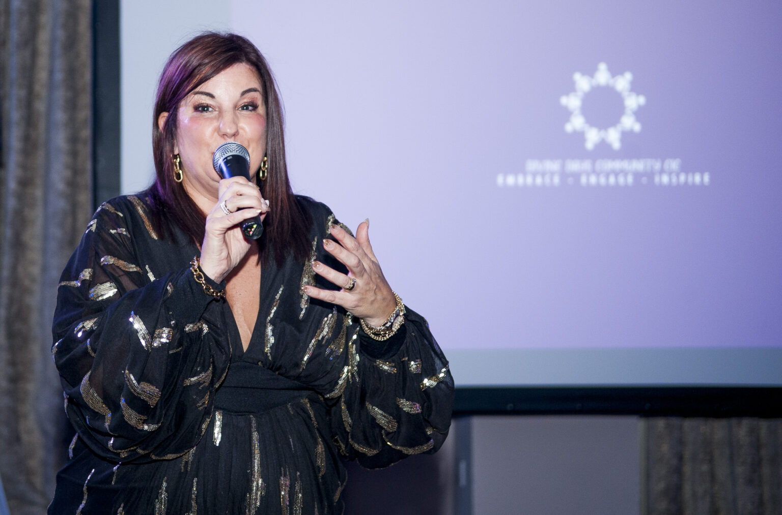 Individual gives a speech at an awards evening