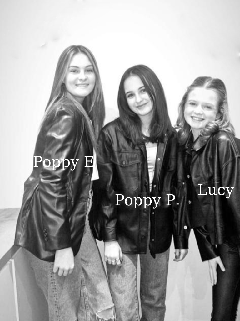 Three young women with names to each of them. From left to right the text reads: Poppy E, Poppy P and Lucy. These girls are in black and white and are smiling